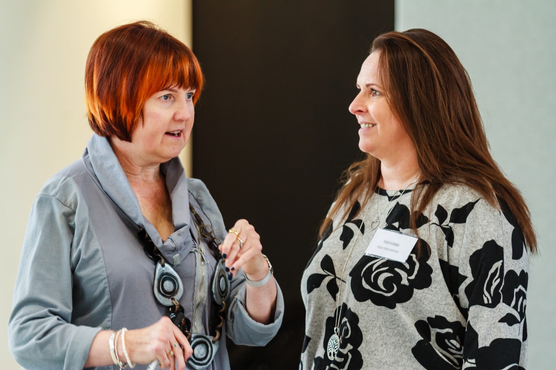Portrait of Kate Nash chatting to members